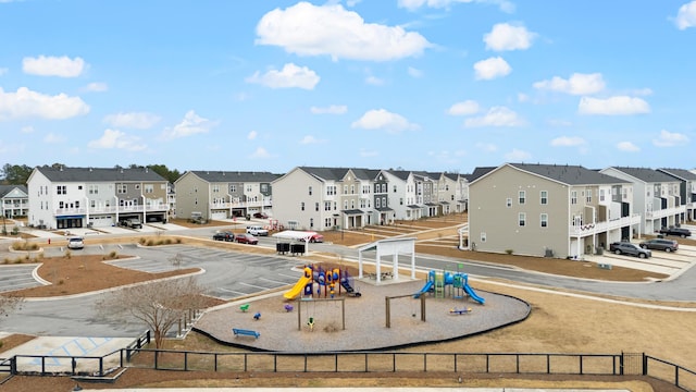 view of home's community featuring a playground