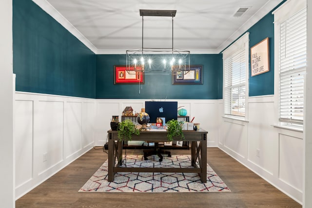 home office featuring wood-type flooring and ornamental molding