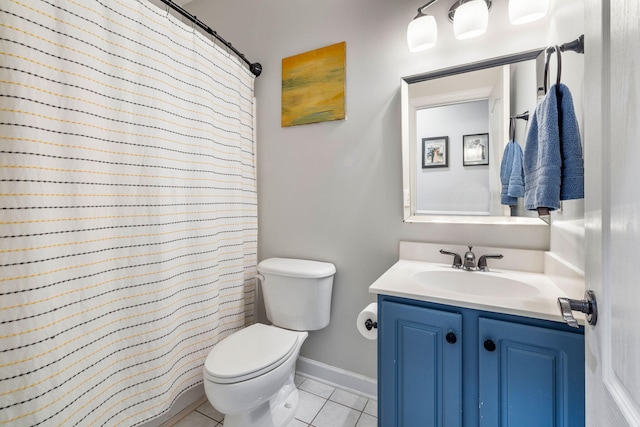 full bathroom with tile patterned flooring, toilet, a shower with shower curtain, vanity, and baseboards