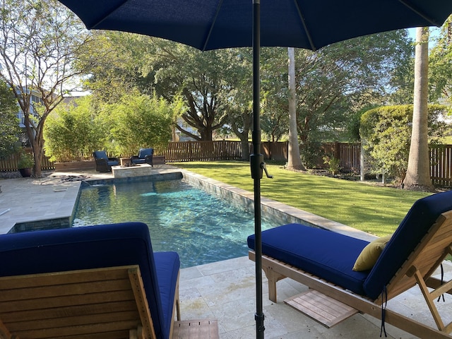 view of swimming pool with a yard, a patio, a fenced backyard, and a fenced in pool