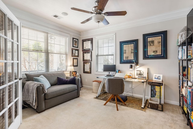 office space featuring carpet floors, baseboards, and crown molding