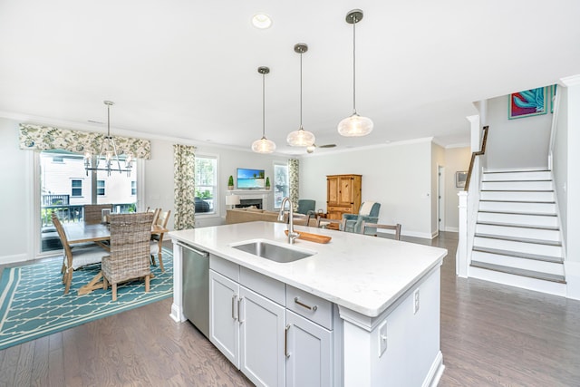 2234 Mother Of Pearl Dr, Mount Pleasant, SC 29466 - kitchen with a sink, dishwasher, crown molding, dark wood-style flooring, and open floor plan