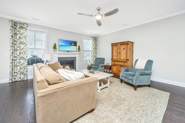 2234 Mother Of Pearl Dr, Mount Pleasant, SC 29466 - living room featuring baseboards, healthy amount of natural light, ceiling fan, a lit fireplace, and ornamental molding