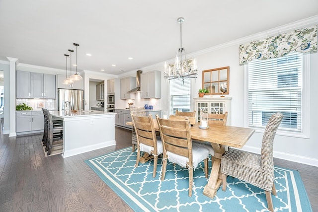 2234 Mother Of Pearl Dr, Mount Pleasant, SC 29466 - dining room with a chandelier, plenty of natural light, dark wood-type flooring, crown molding, and recessed lighting