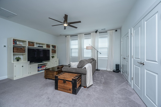 2234 Mother Of Pearl Dr, Mount Pleasant, SC 29466 - carpeted living room with a ceiling fan and baseboards