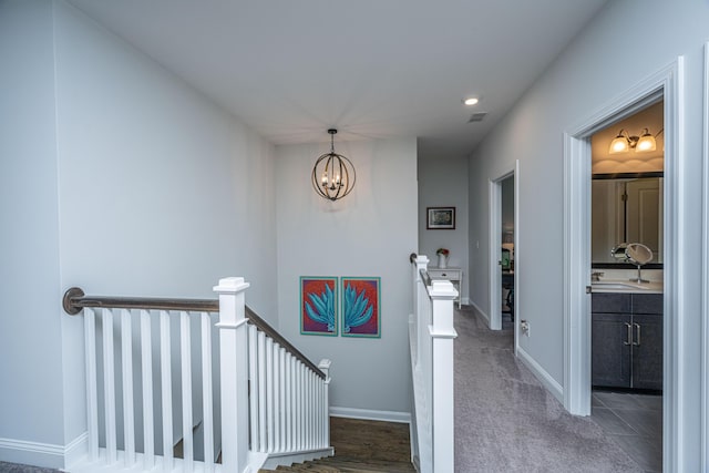 2234 Mother Of Pearl Dr, Mount Pleasant, SC 29466 - stairs with a chandelier, baseboards, and carpet floors