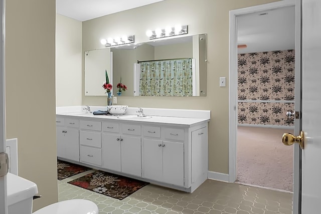 full bathroom with vanity and a shower with shower curtain