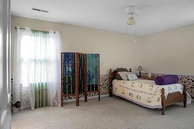 bedroom featuring carpet and visible vents