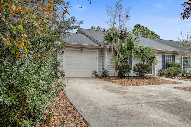 ranch-style house featuring a garage