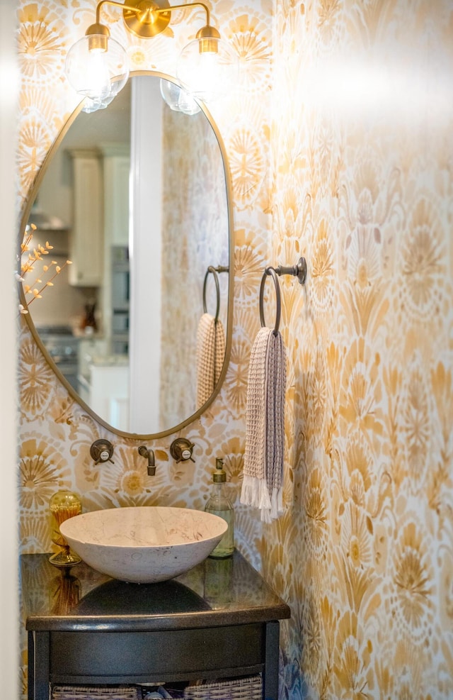 1543 Wando Landing St, Charleston, SC 29492 - bathroom with wallpapered walls and vanity