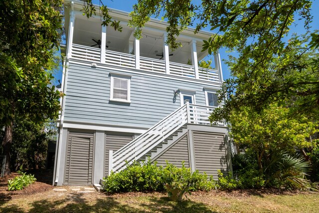 1543 Wando Landing St, Charleston, SC 29492 - rear view of property featuring a balcony and stairs
