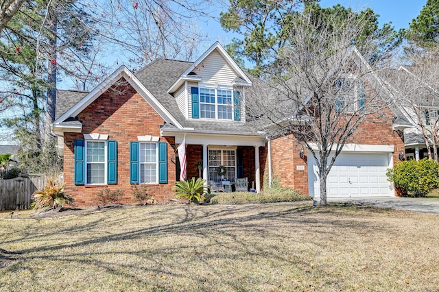 view of front of property with concrete driveway, brick siding, and a front yard