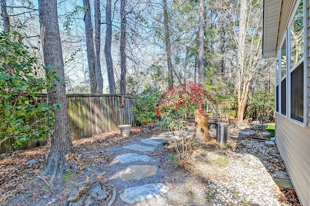 view of yard with a fenced backyard