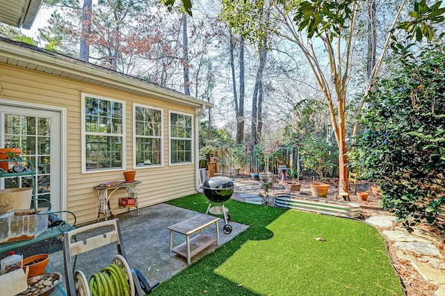 view of yard with a patio area and fence