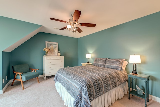 bedroom featuring ceiling fan, carpet, and baseboards