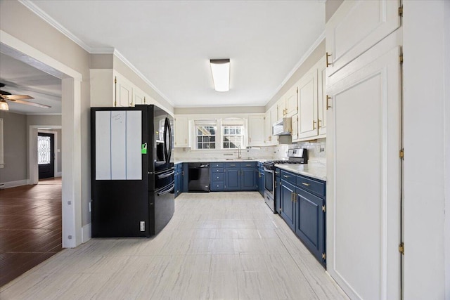 kitchen featuring blue cabinetry, black appliances, crown molding, and a healthy amount of sunlight