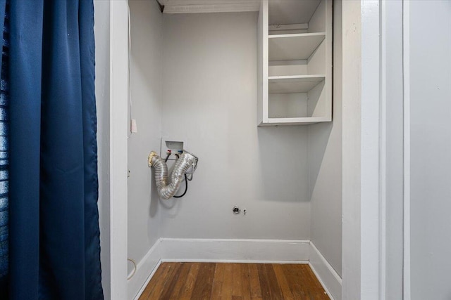 washroom with laundry area, hookup for a washing machine, baseboards, and dark wood-style flooring