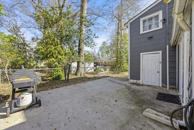 exterior space featuring a patio and fence