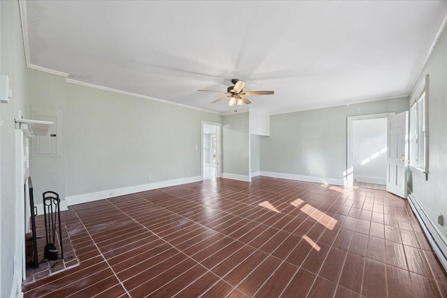 unfurnished room with a baseboard radiator, baseboards, ceiling fan, and crown molding