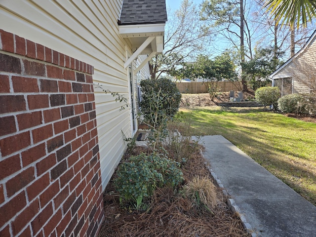 view of yard featuring fence