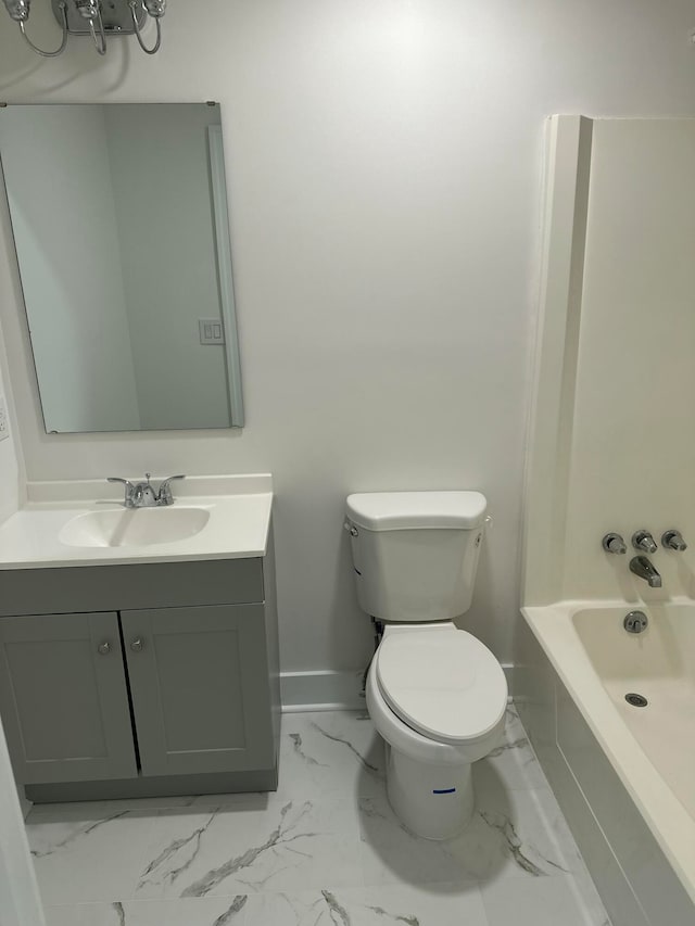 full bathroom with washtub / shower combination, vanity, and toilet