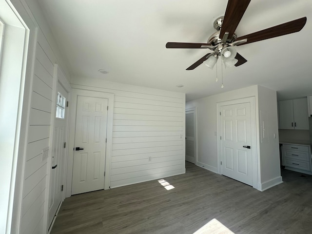 interior space featuring ceiling fan and hardwood / wood-style flooring