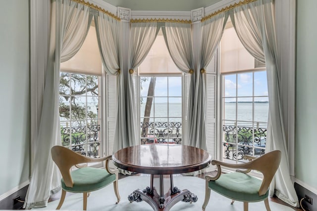 dining room with a water view