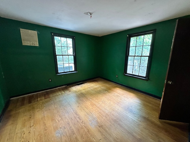 1640 Dogwood Rd, Charleston, SC 29414 - spare room featuring plenty of natural light, wood finished floors, and baseboards