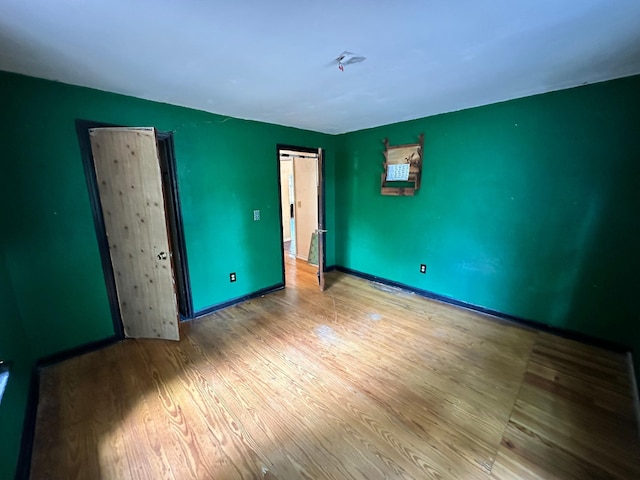 1640 Dogwood Rd, Charleston, SC 29414 - unfurnished bedroom with wood finished floors and baseboards