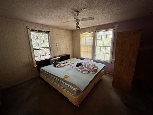 1640 Dogwood Rd, Charleston, SC 29414 - bedroom with multiple windows, a textured ceiling, and ceiling fan