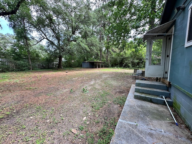 1640 Dogwood Rd, Charleston, SC 29414 - view of yard featuring entry steps and a storage shed