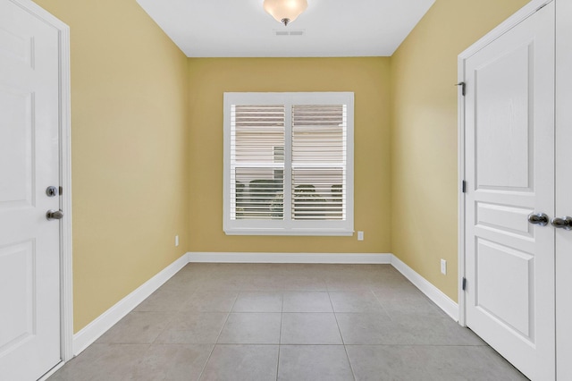 view of tiled spare room