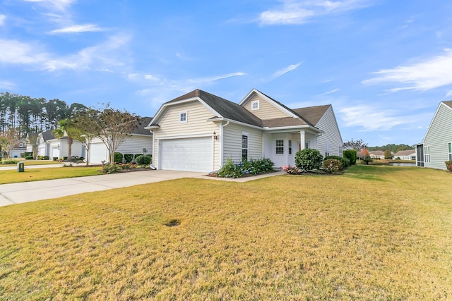 view of front of property featuring a front yard and a garage