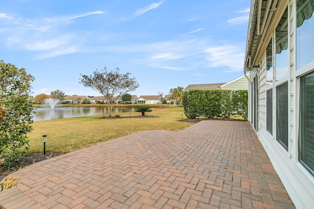 view of patio / terrace with a water view