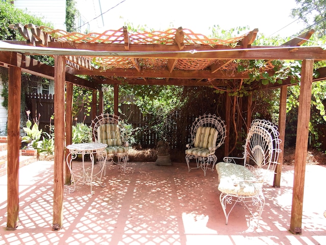 view of patio featuring a pergola