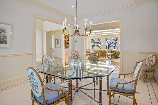 dining area with a notable chandelier and ornamental molding