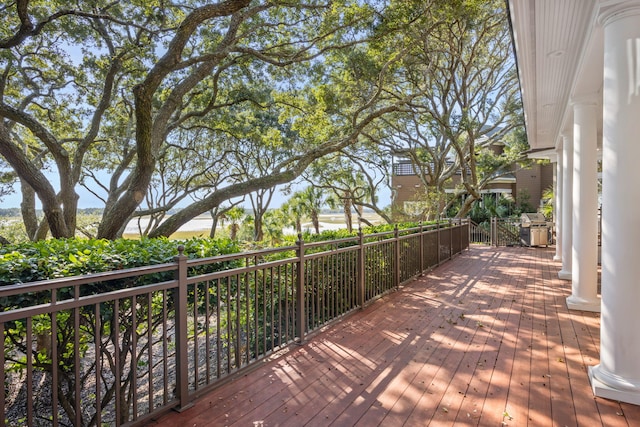 wooden deck featuring grilling area