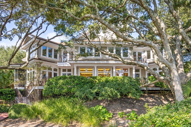 view of front of home with a balcony