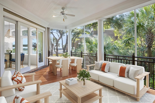 sunroom / solarium with ceiling fan