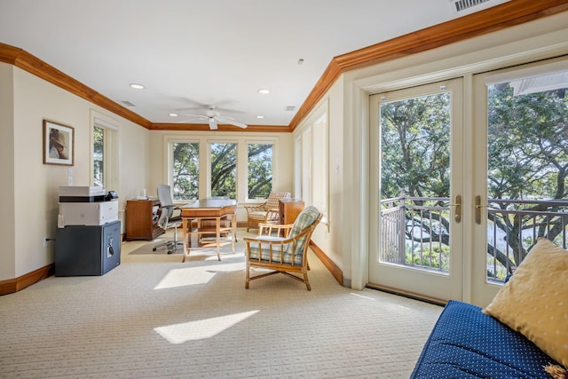 sunroom / solarium with french doors, a wealth of natural light, and ceiling fan