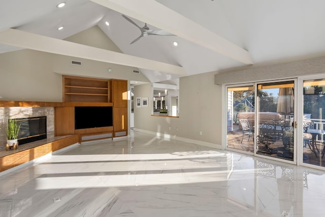 unfurnished living room with high vaulted ceiling, built in shelves, a fireplace, and ceiling fan