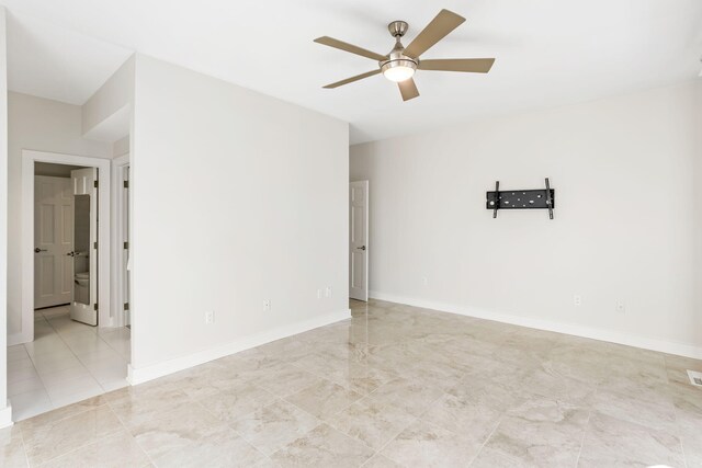 unfurnished room featuring ceiling fan