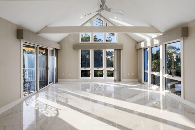 spare room with lofted ceiling with beams and ceiling fan