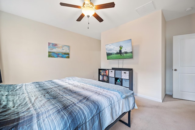 bedroom featuring ceiling fan and light colored carpet