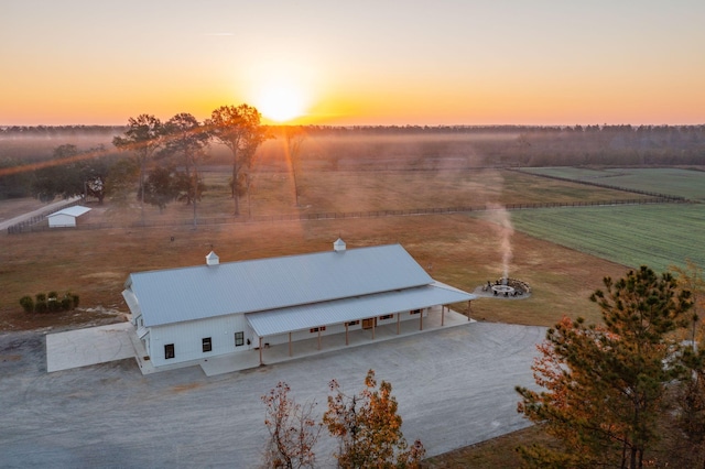 aerial view at dusk with a rural view