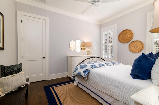 bedroom featuring a ceiling fan, baseboards, ornamental molding, and dark wood-style flooring