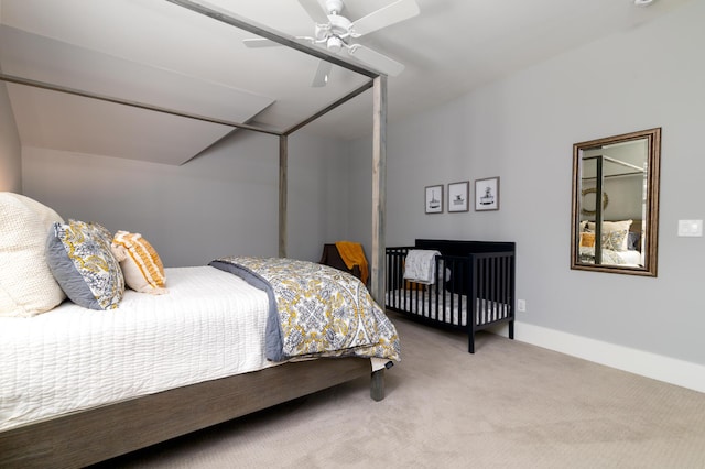 bedroom featuring carpet floors, a ceiling fan, and baseboards