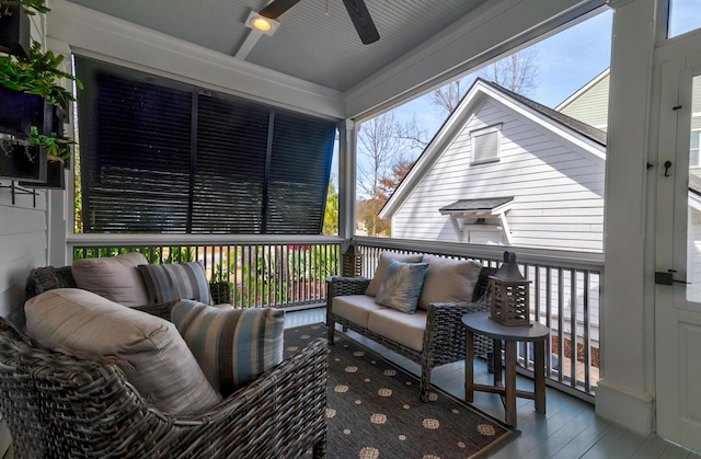 sunroom / solarium with ceiling fan