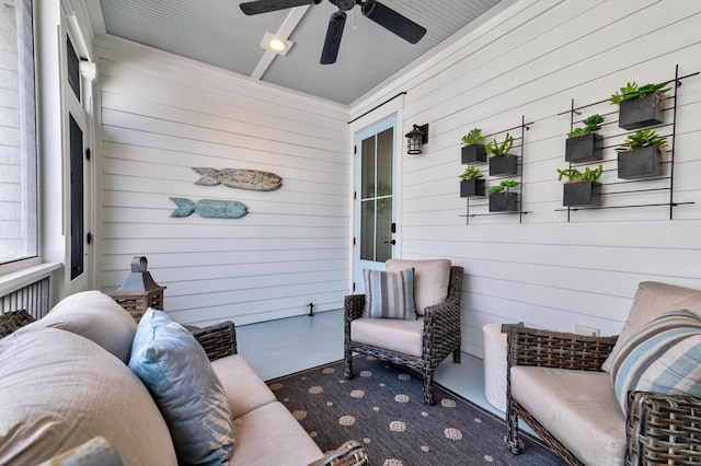 view of patio / terrace featuring a ceiling fan and a porch