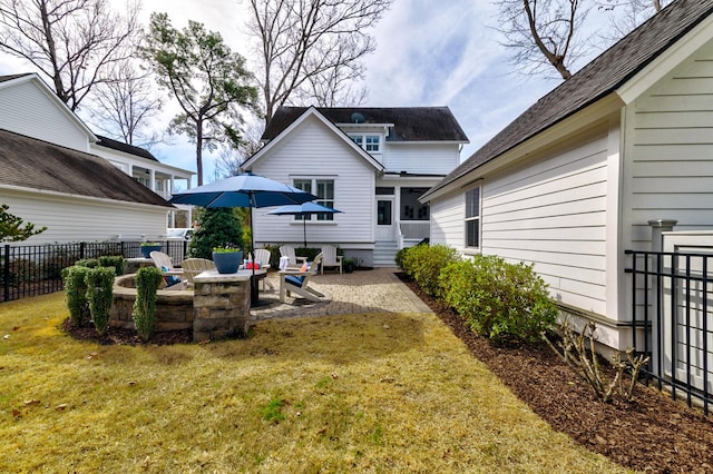 view of yard with entry steps, a patio, and fence